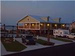 The paved back in sites at dusk at PENSACOLA BEACH RV RESORT - thumbnail