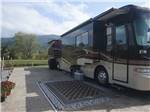 View larger image of Class A Motorhome parked on-site at COVE CREEK RV RESORT image #3