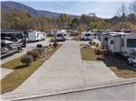 View larger image of One of the paved pull thru RV sites at COVE CREEK RV RESORT image #4