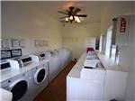 Laundry room with washers and dryers at DUCK CREEK RV PARK - thumbnail