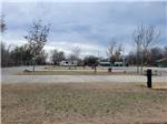 Paved sites surrounded by grass - thumbnail