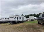 A group of grassy RV sites at SOUTHERN LIVING RV PARK - thumbnail