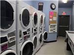 A wall of clothes dryers at CAMP 'N CLASS RV PARK - thumbnail