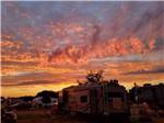 A group of RV sites at dusk at CAMP TURKEYVILLE RV RESORT - thumbnail