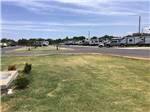 A row of travel trailers in RV sites at BUFFALO BOB'S RV PARK - thumbnail