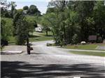 A gravel road leading to the campsites at BERLIN RV PARK & CAMPGROUND - thumbnail