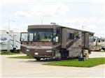 View larger image of RV parked at campsite at AIR CAPITAL RV PARK image #3