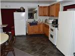 View larger image of Kitchen inside cabin at AIR CAPITAL RV PARK image #9