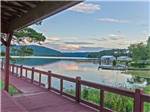 View of the lake with docks and boathouses at WINDEMERE COVE RV RESORT - thumbnail