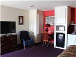 View larger image of The sitting area in one of the hotel rooms at WINNIE INN  RV PARK image #3