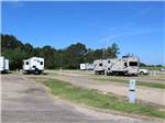 View larger image of A row of long pull thru RV sites at WINNIE INN  RV PARK image #11