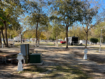 RV in grassy site at Camp Clearwater Family Campground - thumbnail