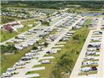 View larger image of Aerial shot of RVs parked in a campground at SOUTHERN OAKS RV RESORT image #7
