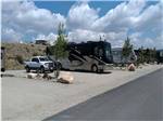 View larger image of A row of gravel RV sites at MIDDLEFORK RV RESORT image #1