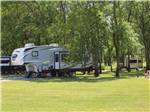 A fifth wheel parked at a site - thumbnail