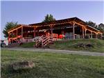 The front of the pavilion lit up at PLUM NELLY RV PARK - thumbnail