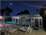 The pool with a retractable roof enclosure at PREFERRED RV RESORT - thumbnail