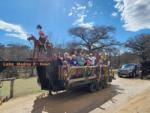 Mardi Gras wagon ride at LAKE MEDINA RV RESORT - thumbnail