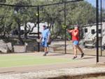 People playing pickleball at LAKE MEDINA RV RESORT - thumbnail