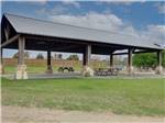 View larger image of Pavilion with picnic tables at WATERS EDGE RV RESORT image #3
