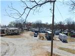 View larger image of View of parked RVs in sites at SPRINGWOOD RV PARK image #9