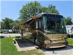 RV with awning at Springwood RV Park - thumbnail