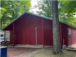 View larger image of Exterior of painted red bathroom building at CHAIN OLAKES CAMPGROUND image #7