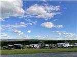 A row of RV sites under a blue sky at LAKEVIEW CAMPING RESORT - thumbnail