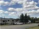 A road in front of gravel RV sites at MOUNTAIN ACRES RV PARK - thumbnail
