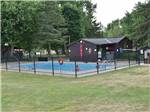 View larger image of The fenced in swimming pool at NICOLSTON DAM CAMPGROUND  TRAVELLERS PARK image #2