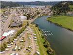RV campground with docks on the banks of a river at COHO RV PARK & MARINA - thumbnail