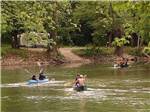 People canoeing and kayaking on the water at HIDDEN PARADISE CAMPGROUND - thumbnail