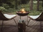 Fire pit with seats at site Shady Oaks RV Park - thumbnail