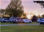 RVs in shaded grass sites - thumbnail