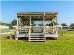 A stage around the fenced in pet area at SANDBAR RV RESORT - thumbnail
