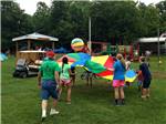 View larger image of People playing games on the playground at YONAH MOUNTAIN CAMPGROUND image #6