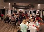 View larger image of People painting in the rec room at VERDE RIVER RV RESORT  COTTAGES image #3