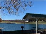 Covered picnic area by the water at Heavenly Hills Resort - thumbnail