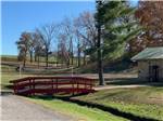 A small bridge over grass at Heavenly Hills Resort - thumbnail