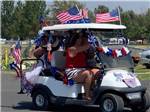 A golf cart in a 4th of July parade at O'SULLIVAN SPORTSMAN RESORT (CAMPING RESORT) - thumbnail