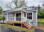 One of the rentals with a deck at MILL CREEK RV PARK & VACATION RENTALS - thumbnail