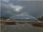 A large rainbow over the beach at OLD MILL RV RESORT - thumbnail