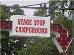 The campground name on a sign with an arrow - thumbnail