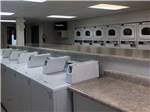 Washers and dryers in the laundry room at PALM GARDENS MHC & RV PARK - thumbnail