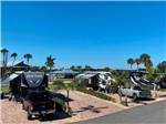A row of back in RV sites at FISHERMAN'S COVE WATERFRONT RV RESORT - thumbnail