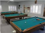 View larger image of Three indoor pool tables at FOREST LAKE VILLAGE RV RESORT image #3