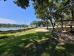 Park with water view at 	Mobile Oaks RV Resort - thumbnail