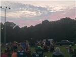 Campers at an outdoor concert - thumbnail