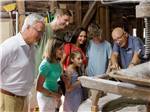 Group of people on a mill tour at Pigeon Forge Department Of Tourism - thumbnail