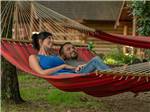 A couple swings on a hammock at Pigeon Forge Department Of Tourism - thumbnail